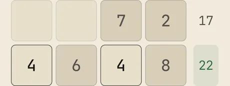 A band of a Crossums grid mid-solve — filled cells and target sums